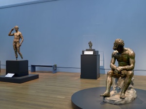 Seated Boxer Seated Boxer, “The Terme Boxer,” 300–200 B.C., bronze and copper. Museo Nazionale Romano—Palazzo Massimo alle Terme, Rome. Su concessione del Ministero dei beni e delle attività culturali e del turismo—Soprintendenza Speciale per il Colosseo, il Museo Nazionale Romano e l’area archeologica di Roma. Photo © Vanni Archive / Art Resource, NY Gallery view, left to right: Victorious Athlete, 300-100 B.C. (The J. Paul Getty Museum); Weary Herakles, A.D. 1-100. (Museo Archeologico Nazionale dell’Abruzzo Villa Frigerj); Seated Boxer, 300-200 B.C. (Museo Nazionale Romano—Palazzo Massimo alle Terme, Rome)